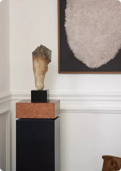 Tall abstract horse head desktop sculpture with a carved finish on a wooden surface.