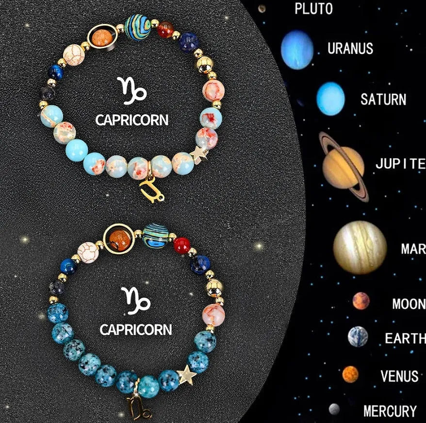 Two natural stone beaded bracelets on a table representing zodiac sign jewellery.