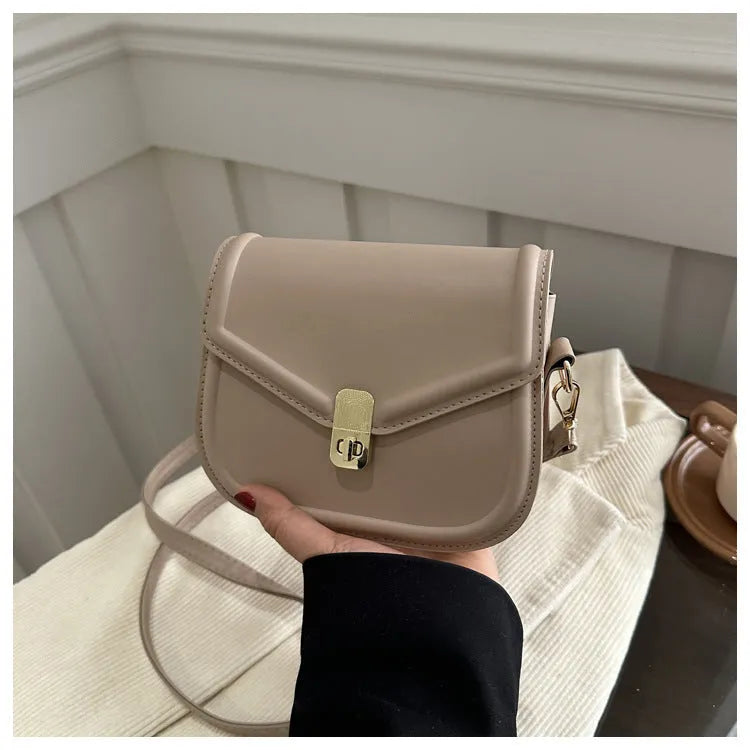 Unisex PU leather clamshell shoulder messenger bag in horizontal square design with adjustable strap