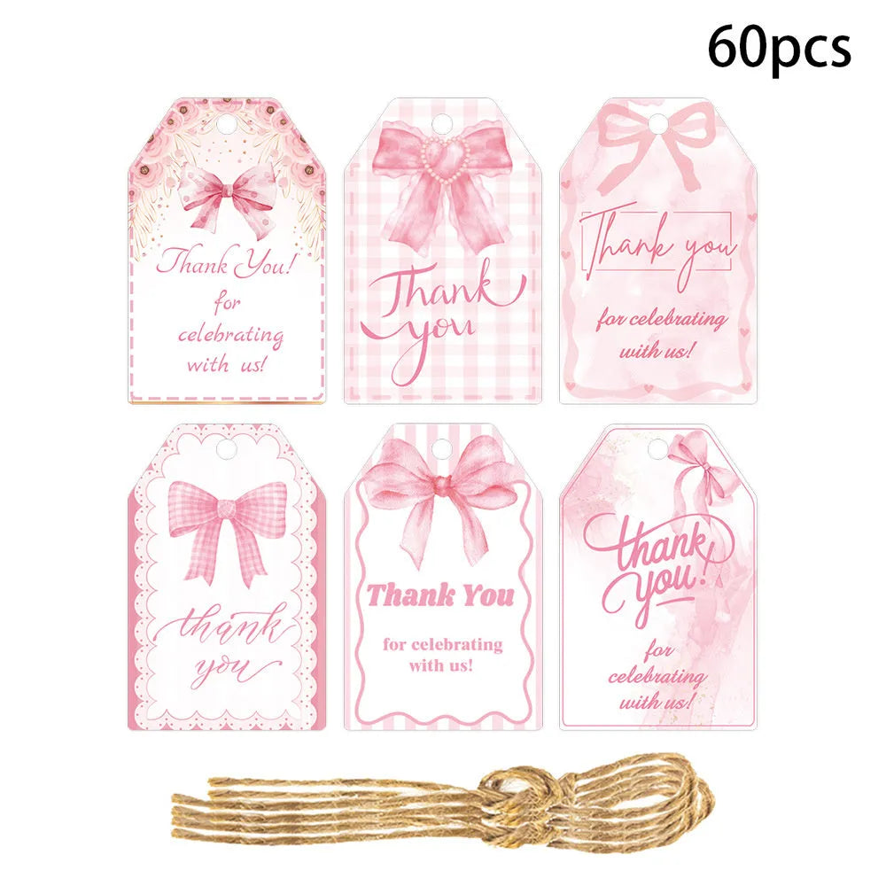 Set of 60 paper birthday gift tags with natural hemp rope in three bowknot designs.