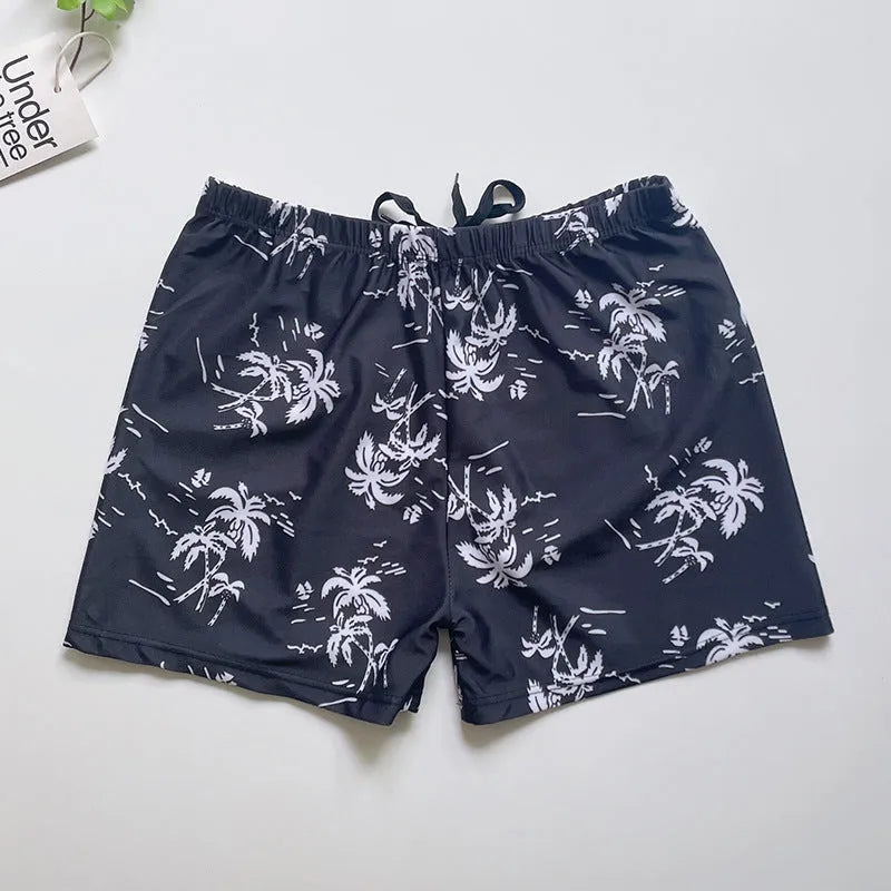 Men's loose-fit polyester swim trunks in dark blue with large flower print, three sizes available
