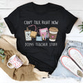 Black cotton loose fit summer T-shirt with short sleeves and round neckline on hanger