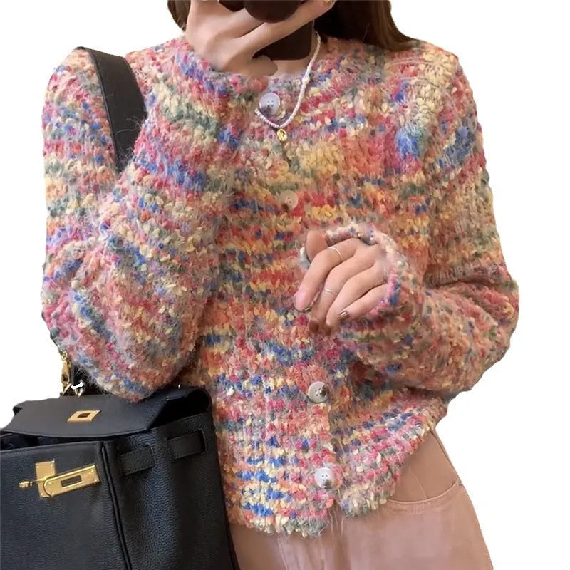 Retro slim fit pink knitted cardigan with regular sleeves on a hanger