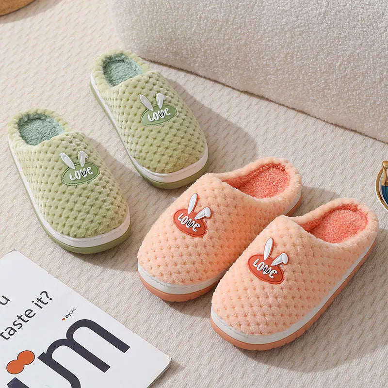 Rabbit plaid pattern women's house slippers with artificial fur upper and rubber sole.