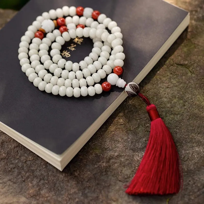 White jade Bodhi beads long bracelet with 6x8mm beads, showing various style options.