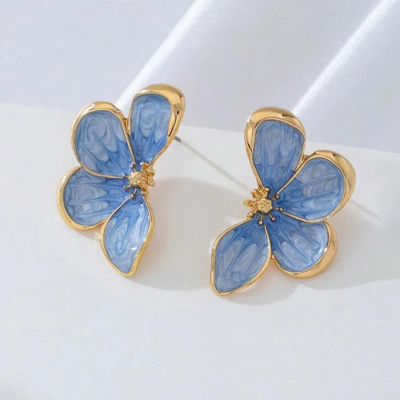 Three-dimensional flower earrings in blue colour with metal finish, exquisite design for women