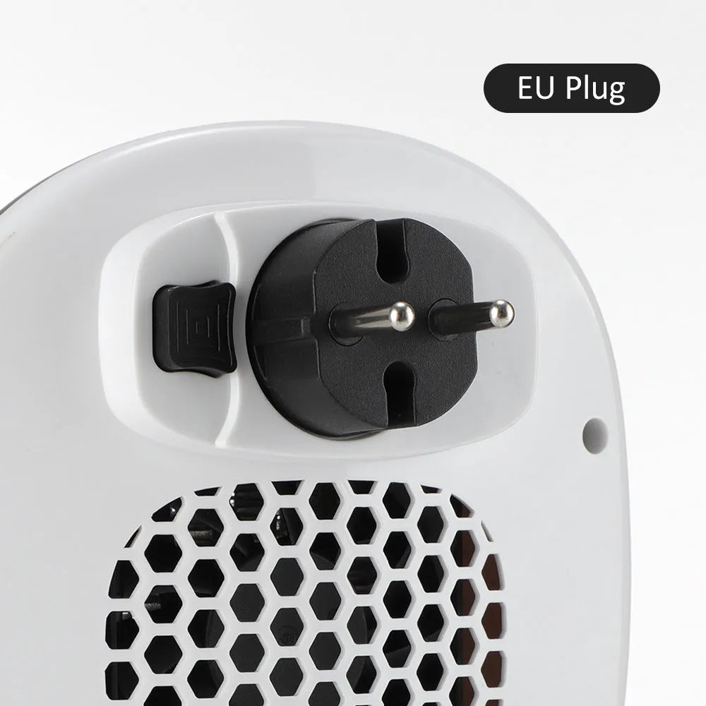 White ceramic heating electric blower heater with remote control on table