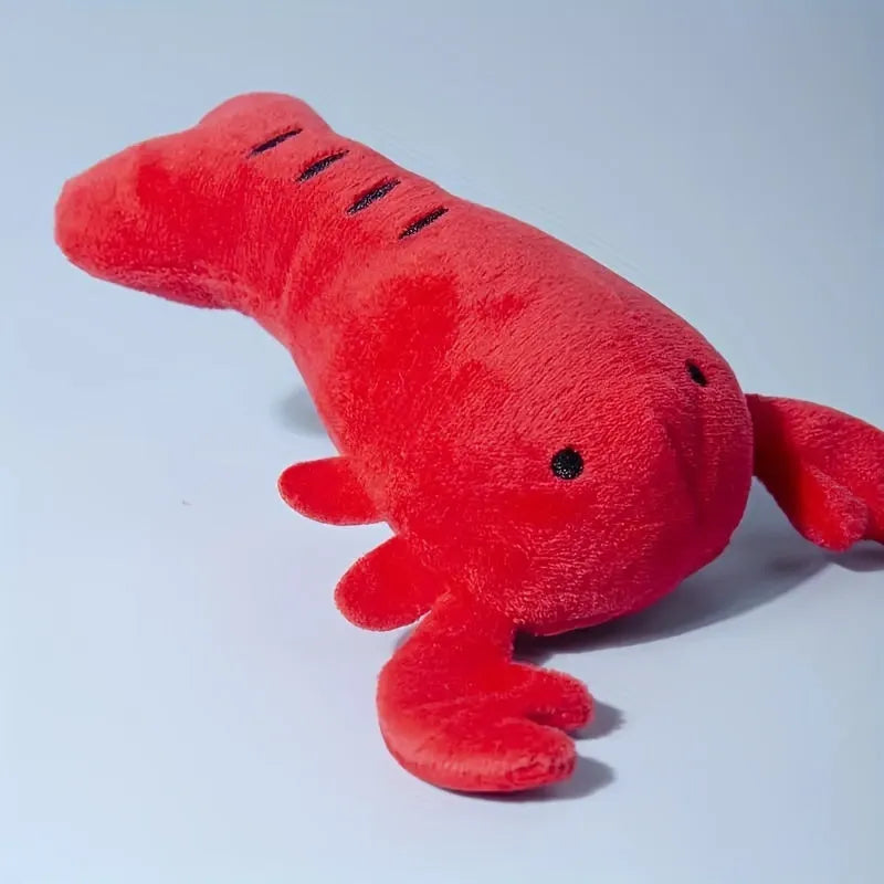 Red plush lobster-shaped squeaky dog toy for small and medium breeds.