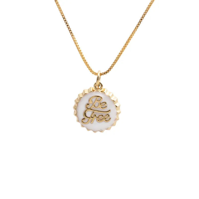 Copper bottle cap pendant necklace on a 40cm box chain with an 18K gold electroplated finish.