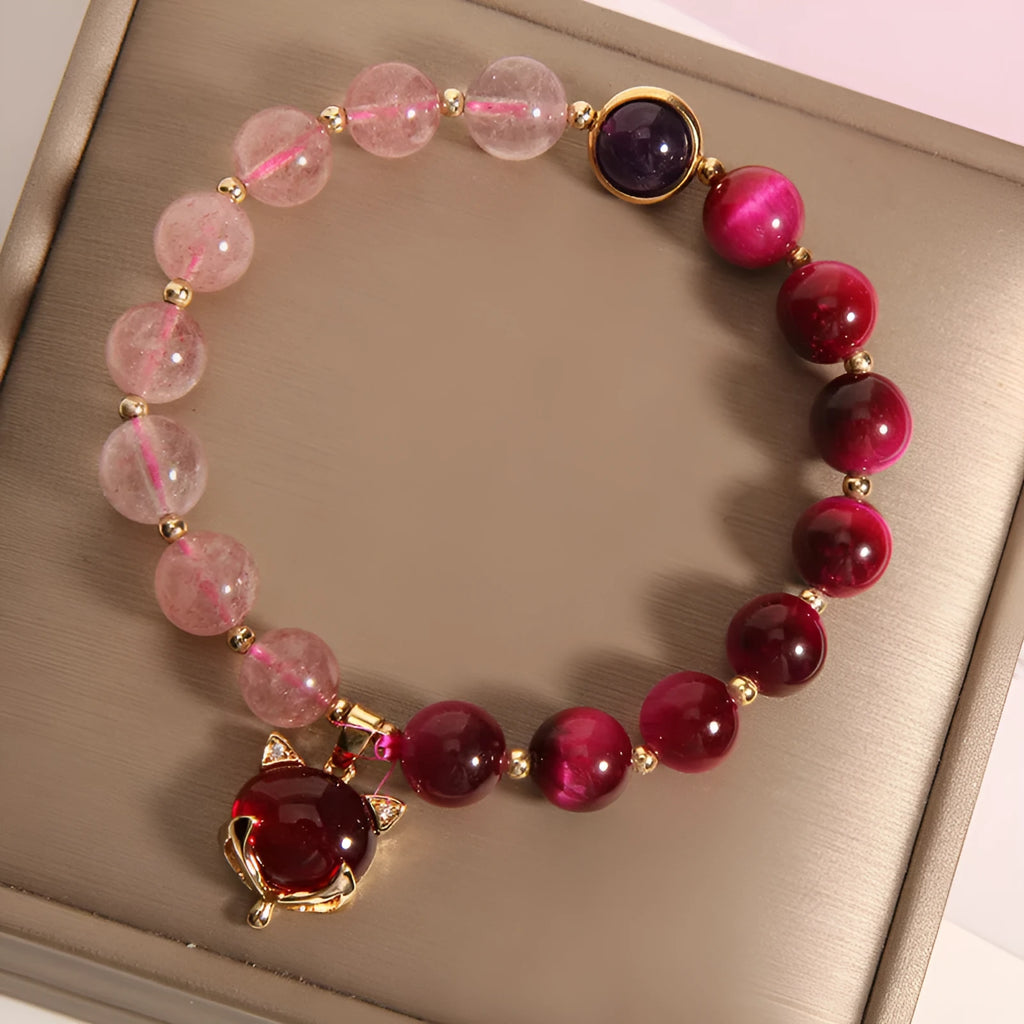 Women's strawberry crystal bracelet on elastic rope measuring 18cm with simple jewellery design