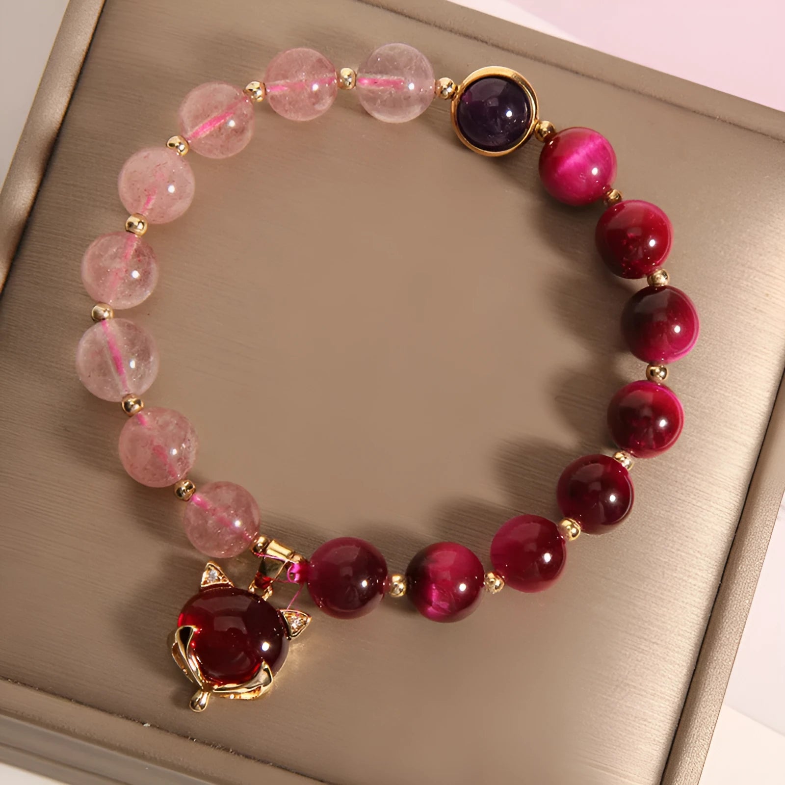 Women's strawberry crystal bracelet on elastic rope measuring 18cm with simple jewellery design