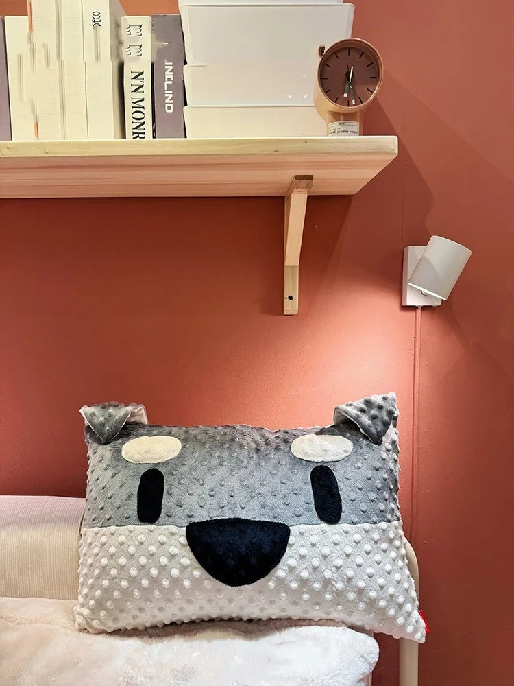 Grey schnauzer print and white West Highland print dog pillow measuring 50x35cm