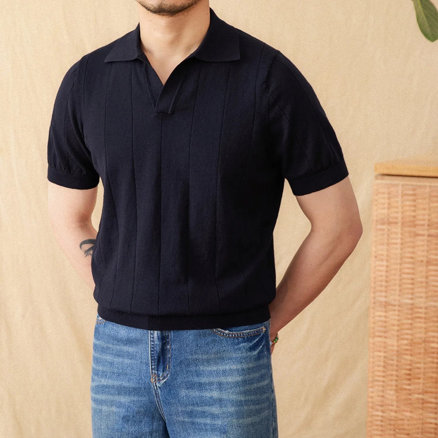 Purple cotton and linen knitted polo top with short sleeves, a seagull collar, and a sunken stripe pattern.