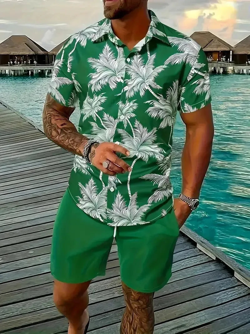 Man wearing a blue Hawaiian print short sleeve shirt and matching shorts from the casual suit set.