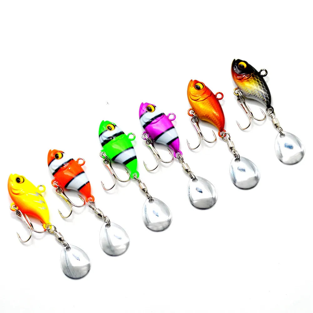 Metal fishing lure with rotating sequins in gold colour option