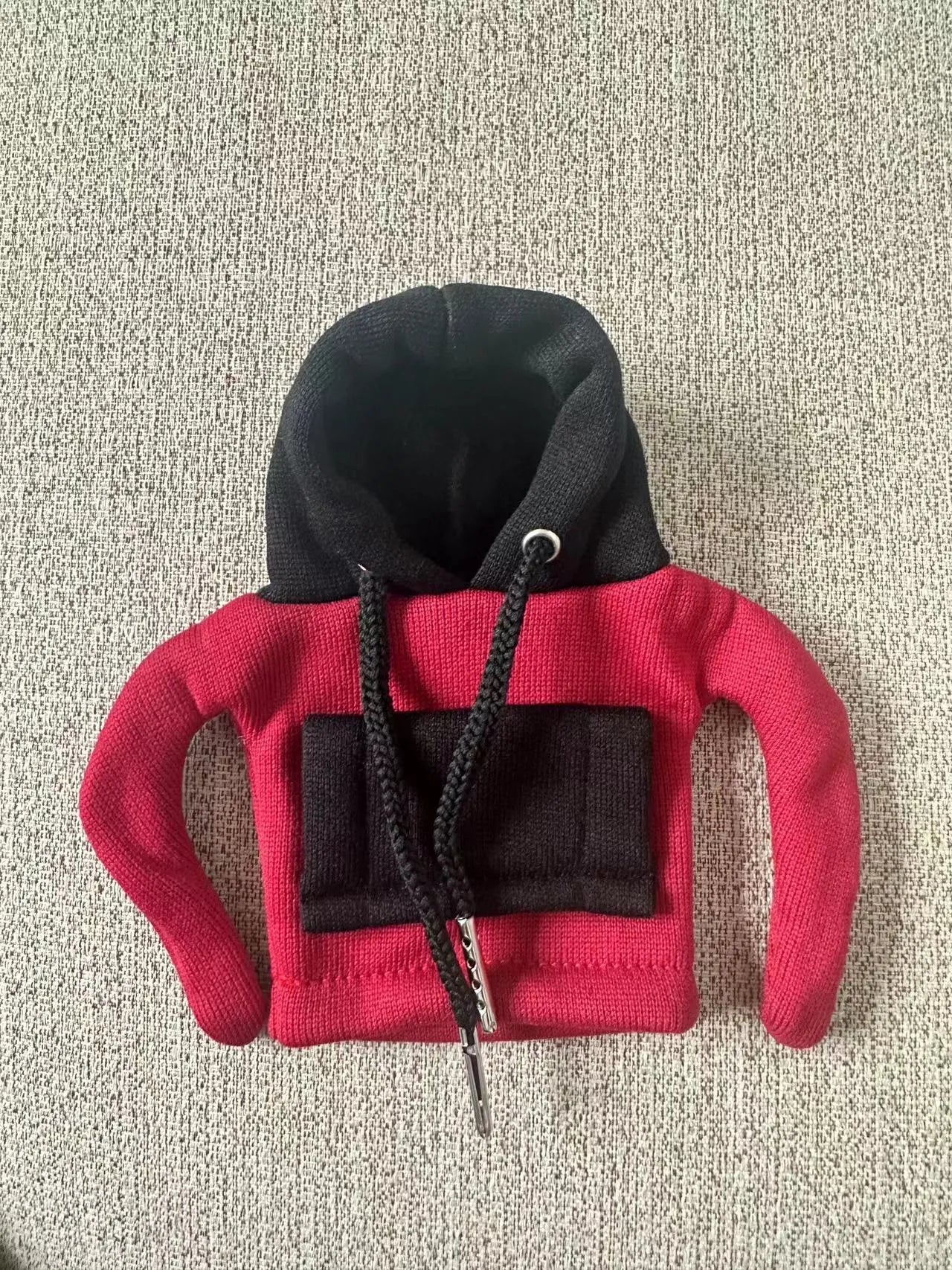 Red and white Christmas-themed polyester hood cover for a car gear shift lever.