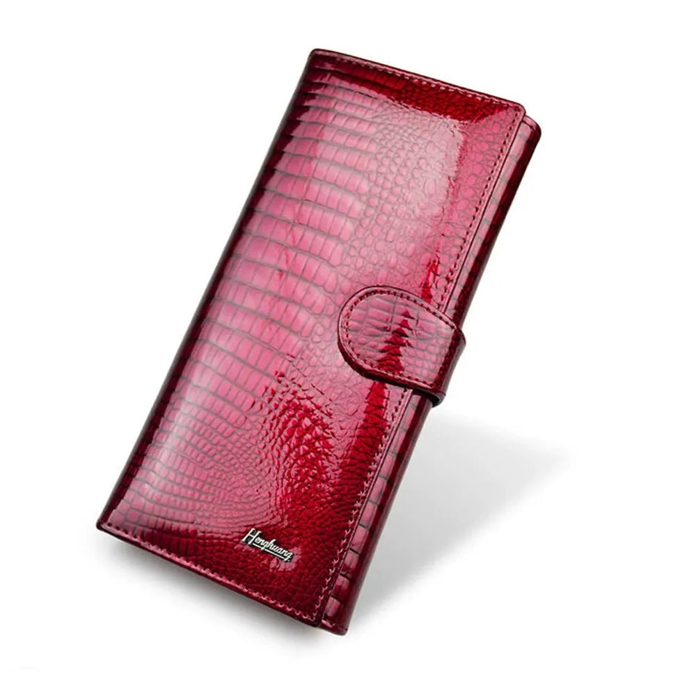 Women's leather coin purse with crocodile pattern texture in red colour