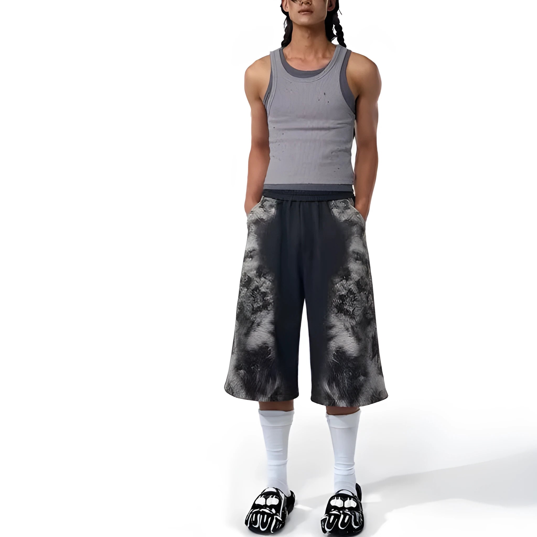 Streetwear set showing trousers, hoodie, and shorts in printed polyester fabric with loose fit design