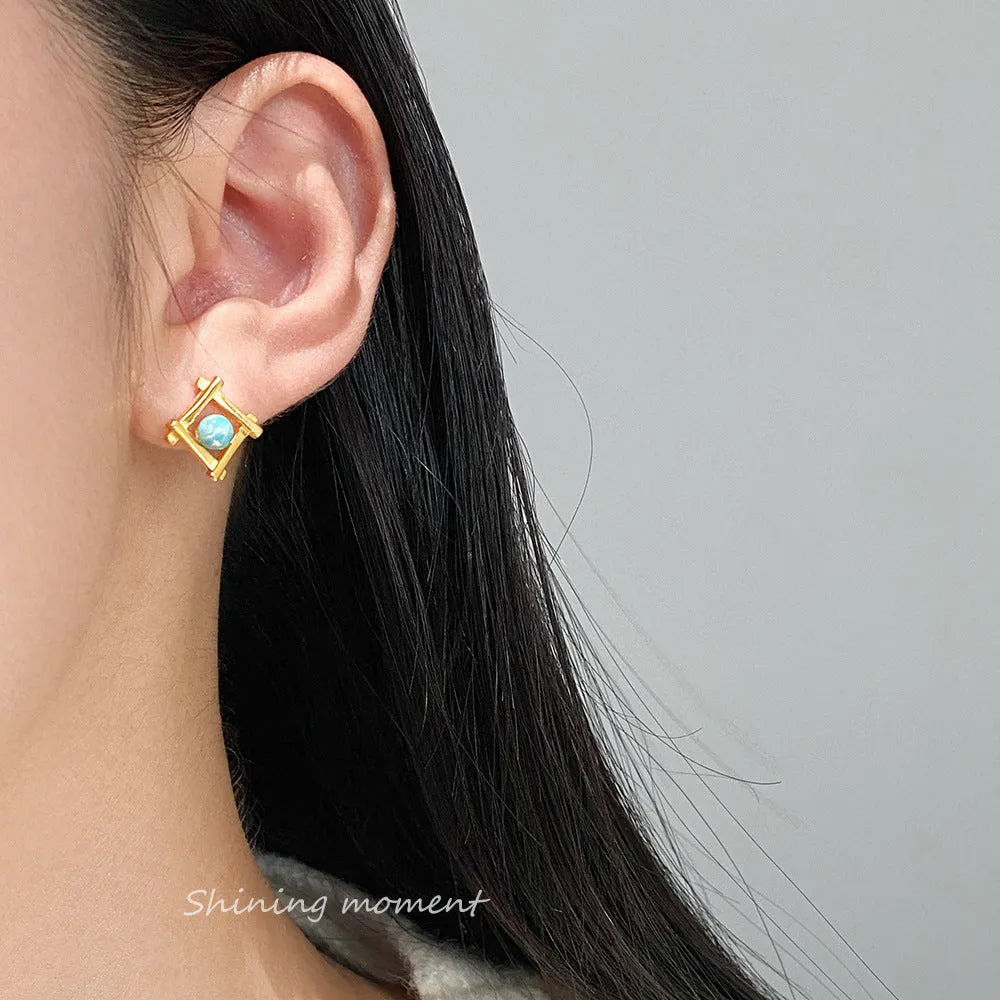 Women's geometric cross quadrangle stud earrings in sterling silver with gold or silver plating options