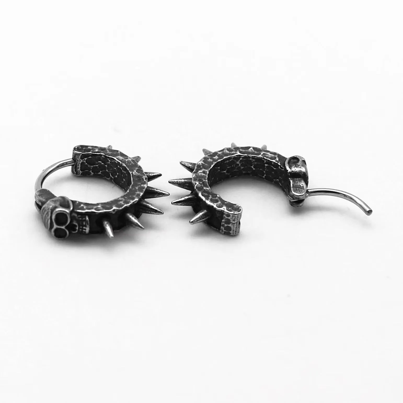 Geometric motorcycle punk earrings in retro black with copper accents and alloy construction