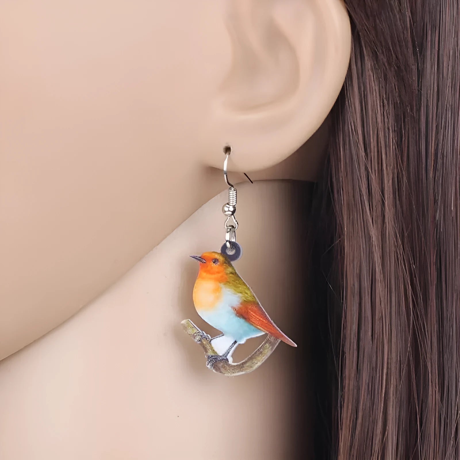 Acrylic blue titmouse pendant earrings with geometric animal and snake zodiac design in colourful printing