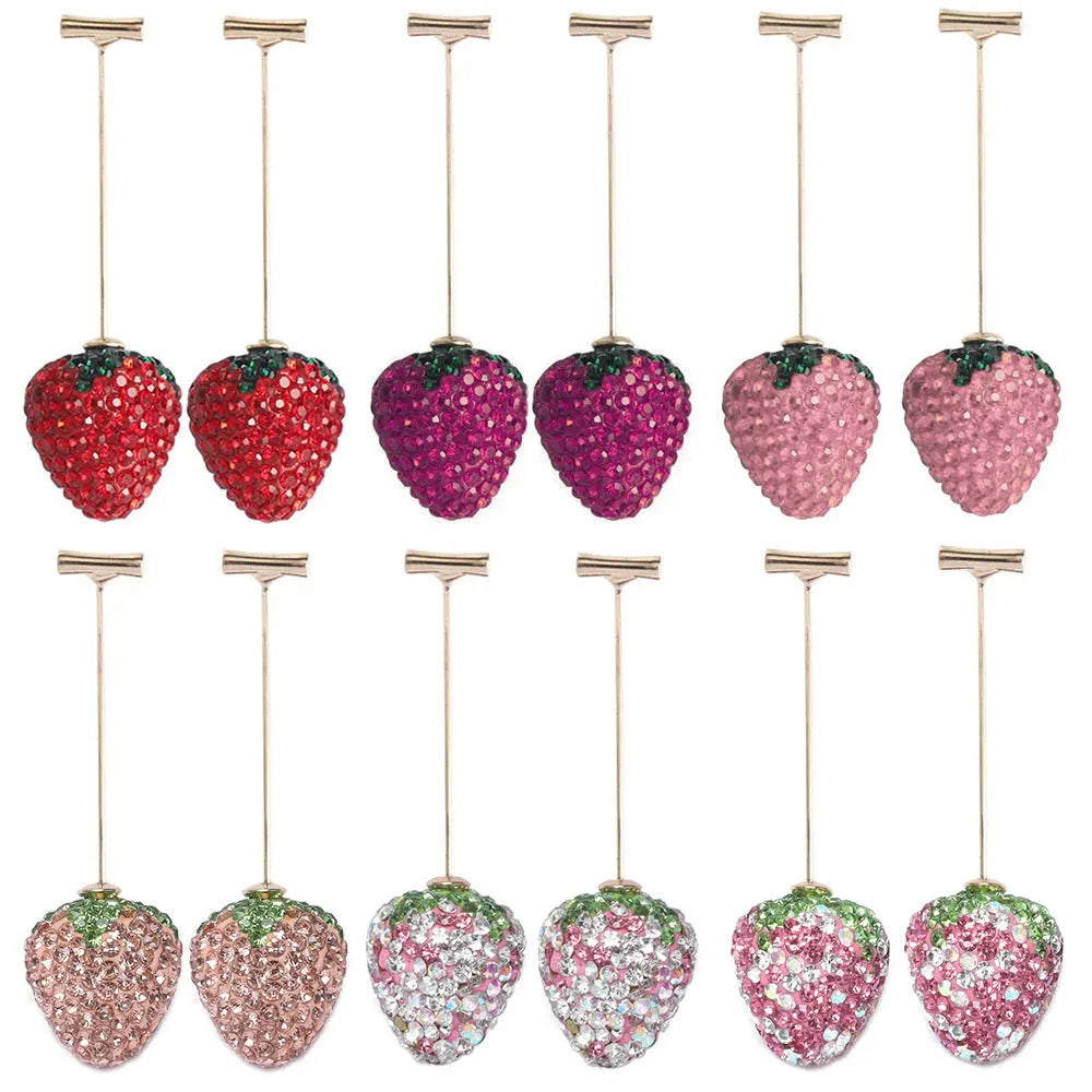 Women's geometric strawberry earrings with spot drill detail in red zinc alloy.