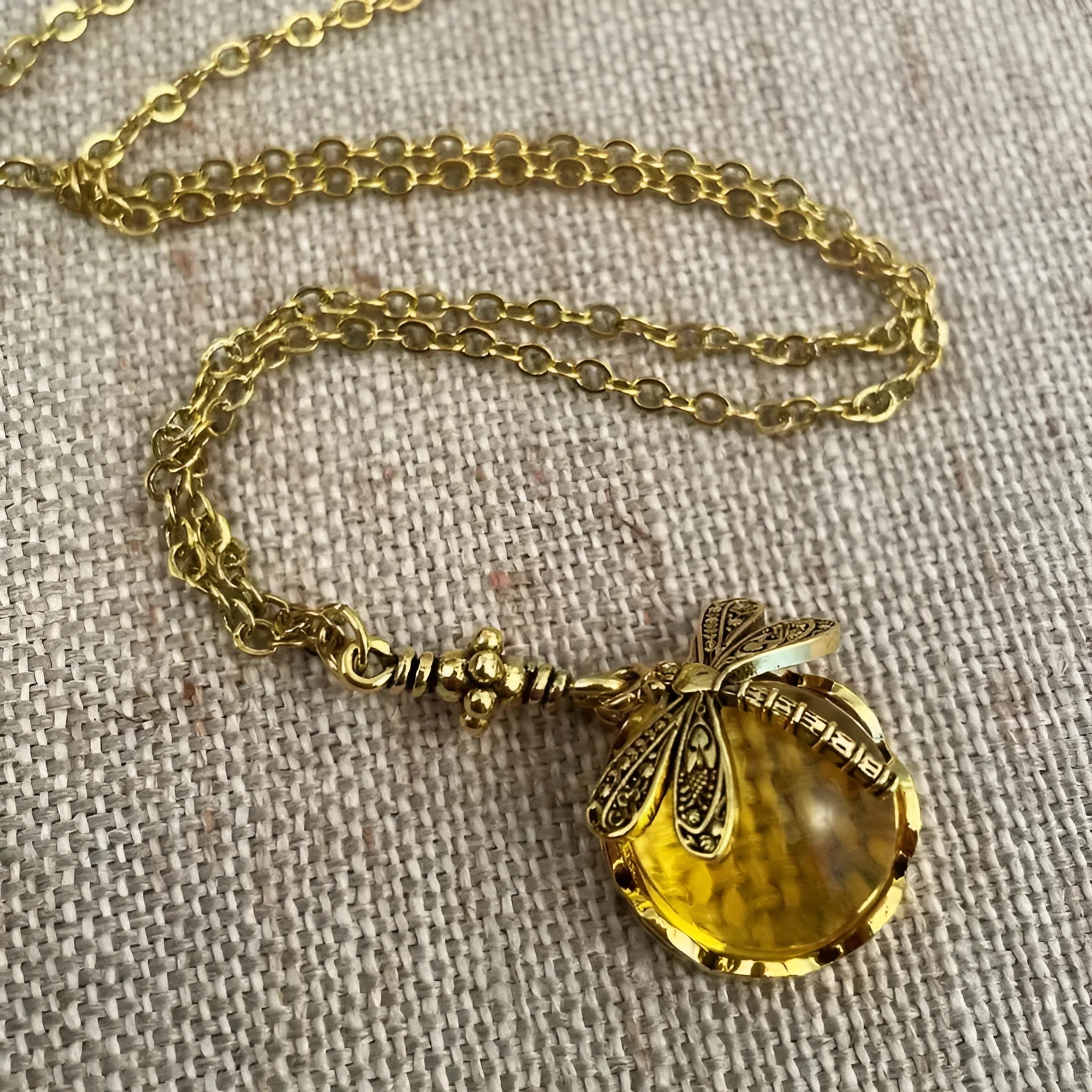 Hand carved dragonfly pendant necklace in vintage bronze colour on 925 silver chain