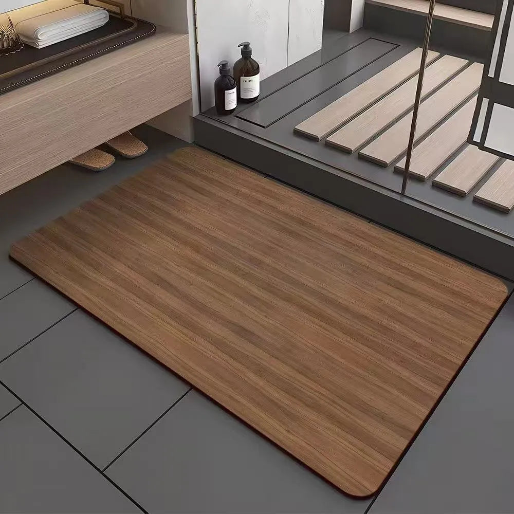 Square diatomite bathroom floor mat with wood grain geometric pattern in a bathroom setting.