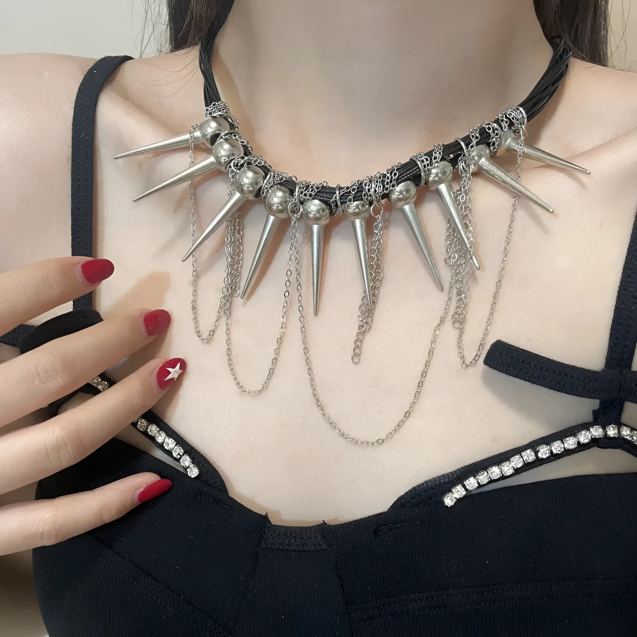Women's casual leather necklace with electroplated round beads, rivet detailing, and winding tassel design