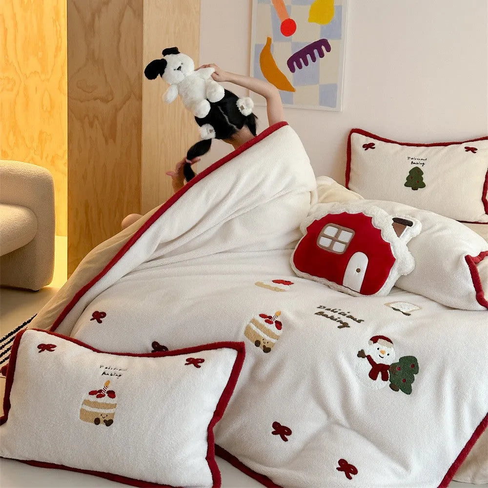 Christmas cartoon bedding four-piece set showing bed sheet, duvet cover and pillowcases with pastel milk cake pattern