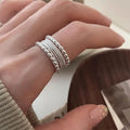 Adjustable geometric copper ring with woven twisted multilayer design for women