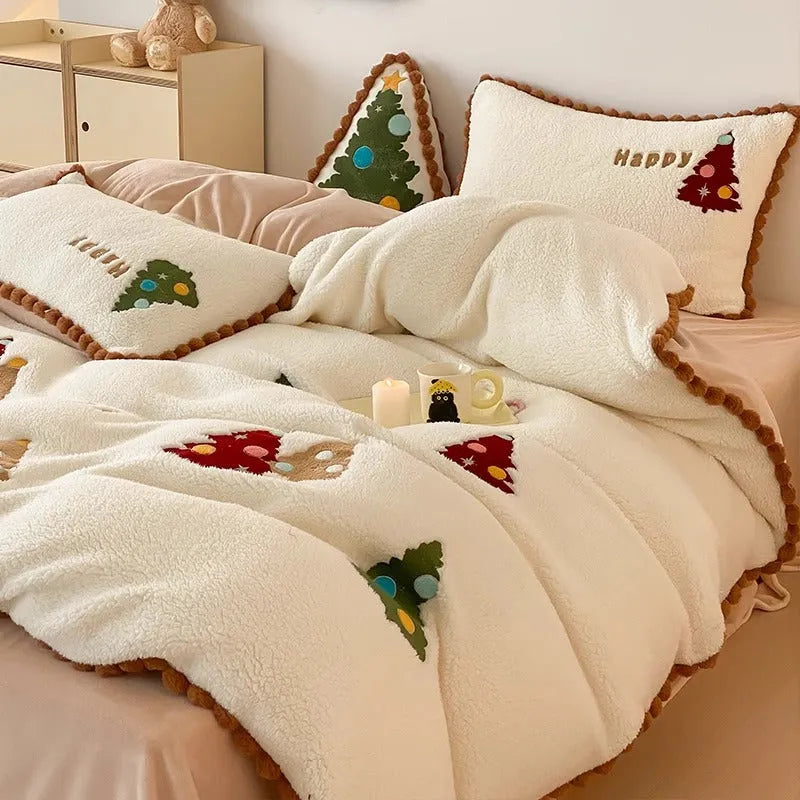 Bright yellow winter Christmas bedding four-piece set with cartoon pattern on a bed, showing fleece-lined quilt cover, sheet, and pillowcases.