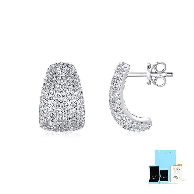 Geometric S925 sterling silver stud earrings with white moissanite stones on a gift box.