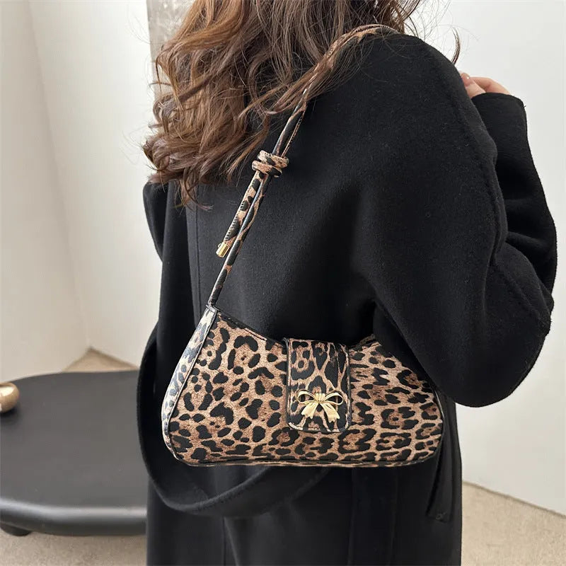 Women's casual PU handbag with sandwich pocket in brown colour showing 27cm dimensions