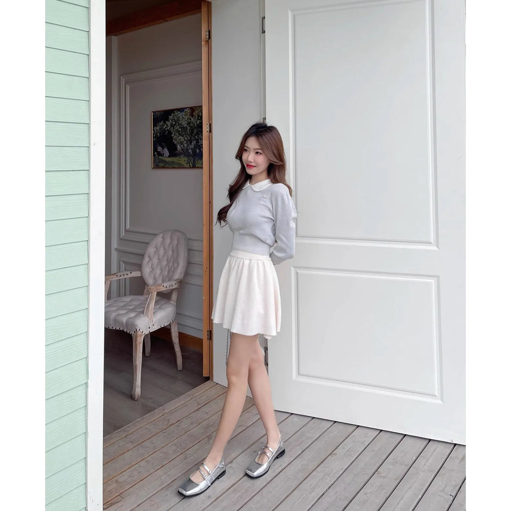 Women's silver leather ballet flats with cross-strap buckle and round toe