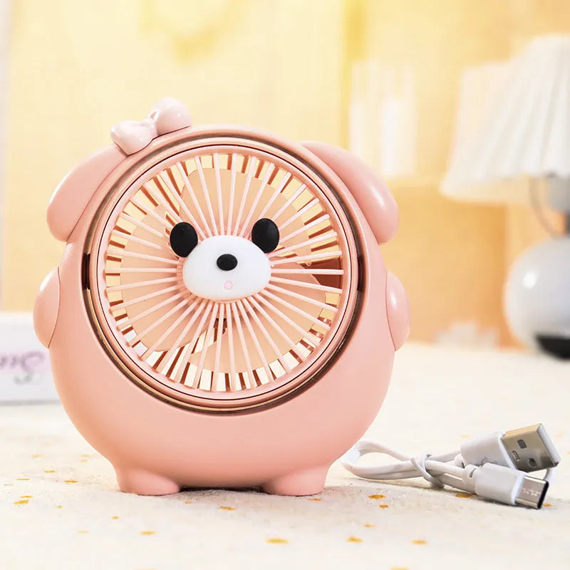 Desktop USB electric fan with cute dog design showing six colour options including bear brown and pink puppy variations