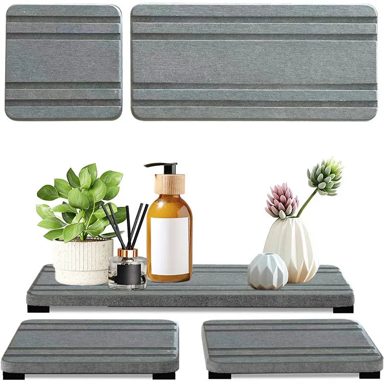 Set of three square diatomaceous earth bathroom draining pads in solid colours