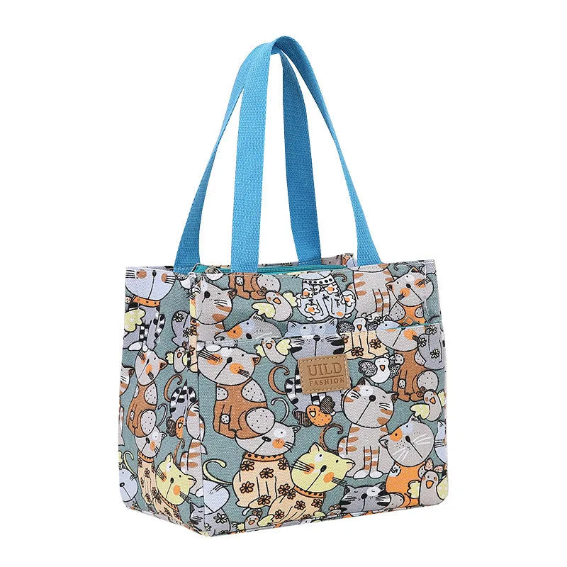 Women's printed canvas handbag with floral design and aluminium hardware in square shape