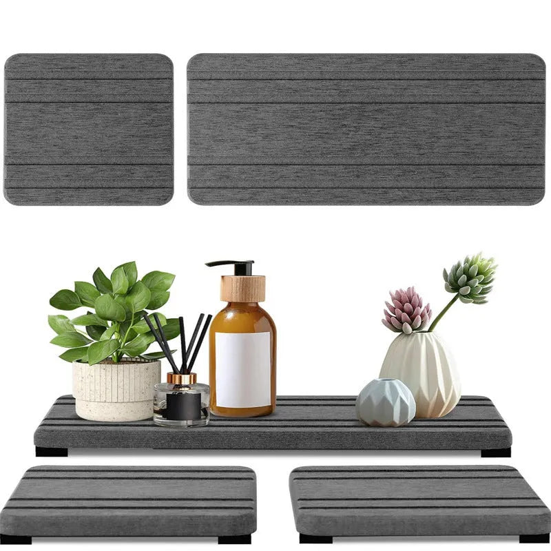 Set of three square diatomaceous earth bathroom draining pads in solid colours