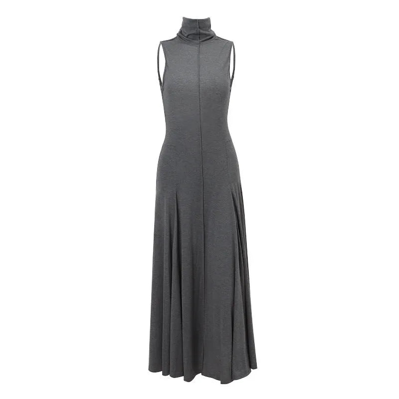 Grey slim-fit women's dress with a half turtleneck neckline and backless design