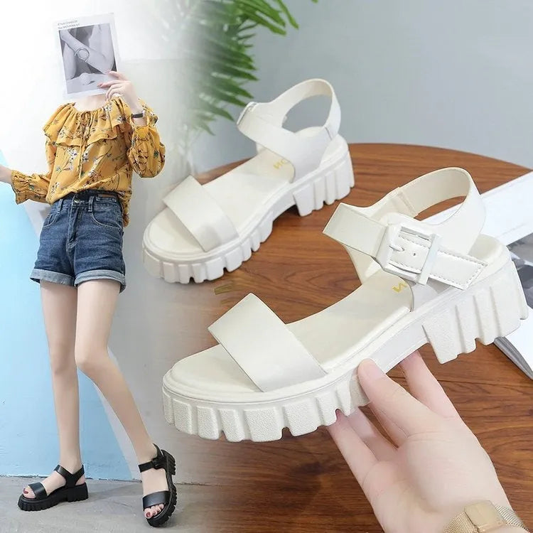 Women's beige peep toe platform sandals with ankle-strap buckle on foot