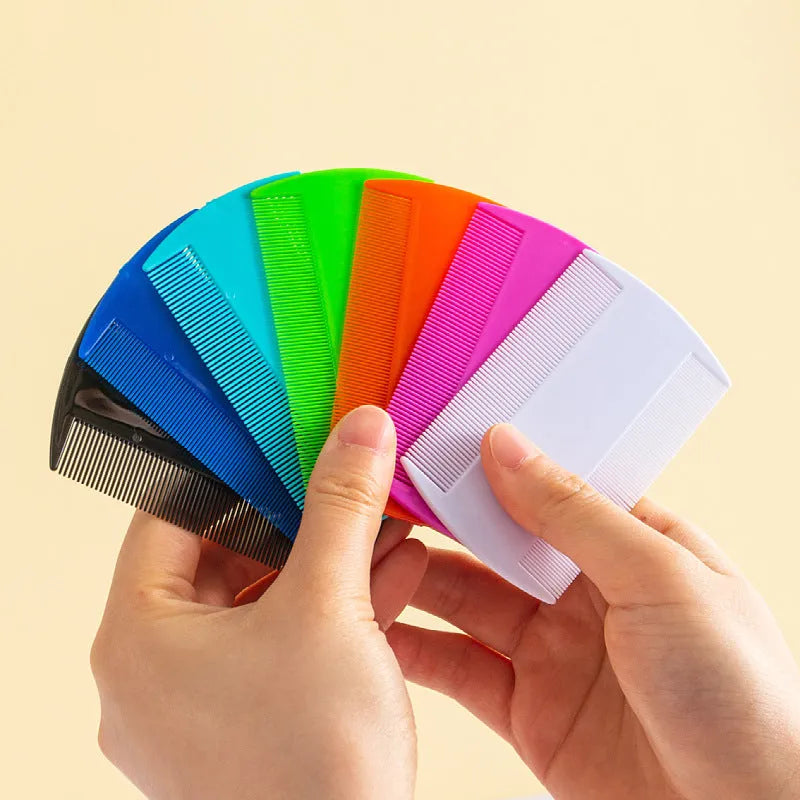 Double-edged plastic flea and lice comb in assorted colours, showing fine teeth.
