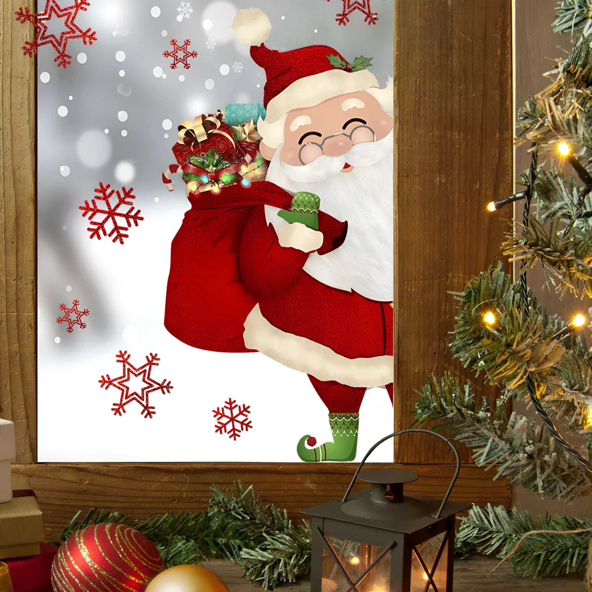 Static PVC wall sticker with snowflake and Santa Claus design, 27x40cm, on a window showcase