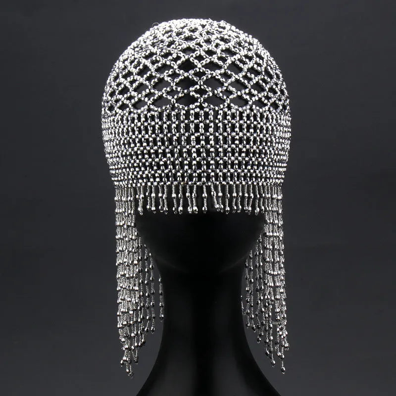 Handmade beaded belly dance head ornament with tassel on alloy mesh, in silver or black.
