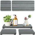 Set of three square diatomaceous earth bathroom draining pads in solid colours