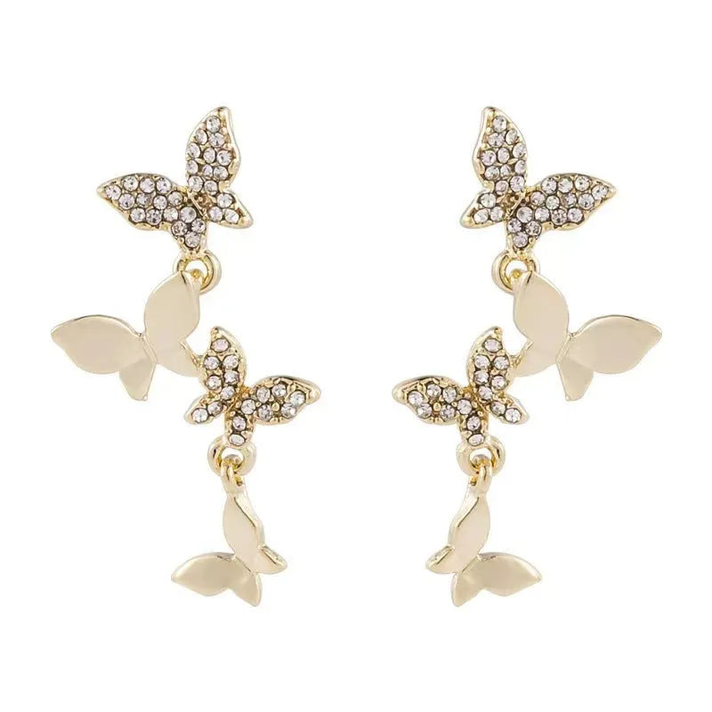 Gold-toned copper butterfly drop earrings with four-butterfly design for women