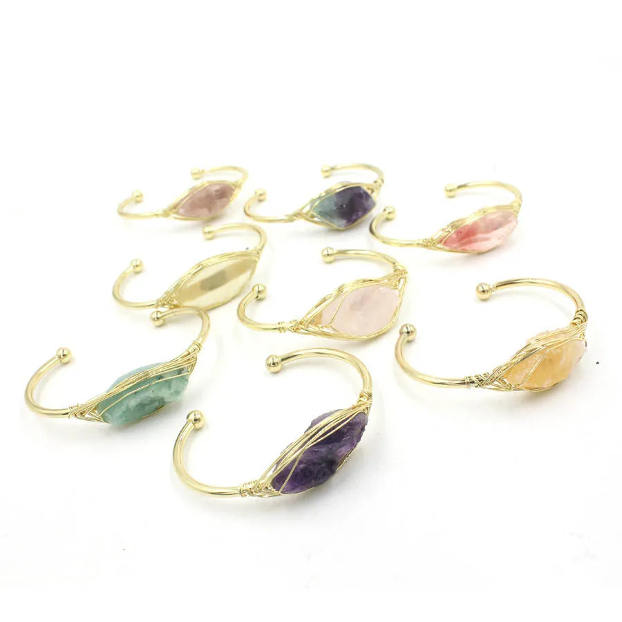Natural raw gemstone crystal bracelet in ethnic style with simple opening, shown in one of nine colour options.
