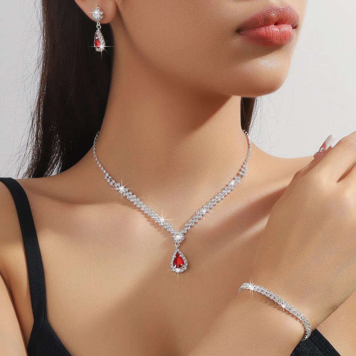Claw chain rhinestone jewellery set with water drop design in multiple colour options