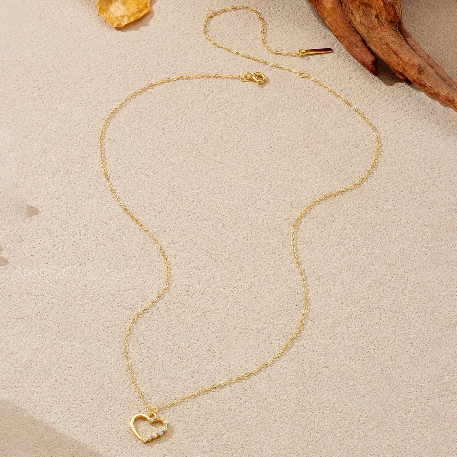 S925 sterling silver hollow heart necklace with gold plating options on regular chain