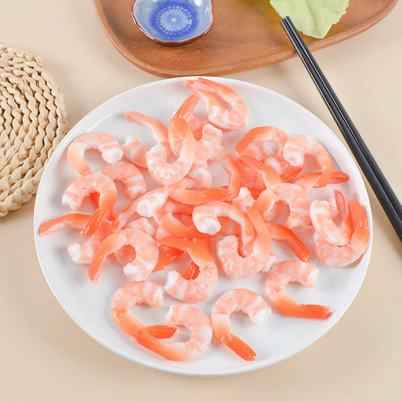 PVC injection moulded shrimp-shaped keychain with modern minimalist design